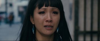 Movie still from “Hustlers” (2019), directed by Lorene Scafaria – A person with a crying face; Close Up shot, Overhead angle