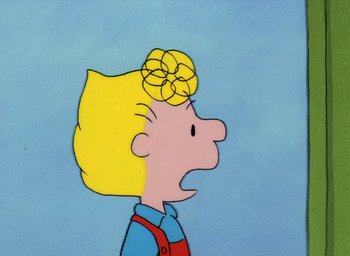 Movie still from “It's Christmastime Again, Charlie Brown” (1992), directed by Bill Melendez – A drawing of a girl with a flower on her head; Close Up shot, High angle