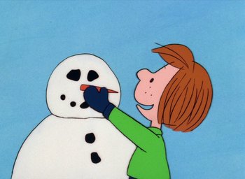 Movie still from “It's Christmastime Again, Charlie Brown” (1992), directed by Bill Melendez – A drawing of a person making a snowman with a paintbrush; Extreme Close Up shot, Low angle