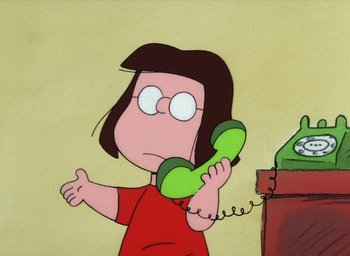 Movie still from “It's Christmastime Again, Charlie Brown” (1992), directed by Bill Melendez – A woman holding a phone up to her ear; Medium shot, High angle
