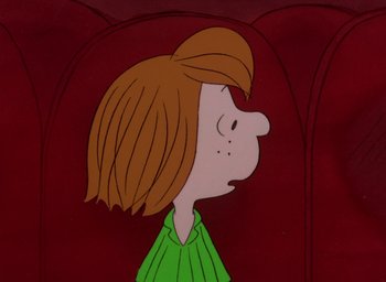 Movie still from “It's Christmastime Again, Charlie Brown” (1992), directed by Bill Melendez – A girl's face in a cartoon; Close Up shot, High angle