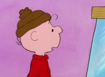 Movie still from “It's Christmastime Again, Charlie Brown” (1992), directed by Bill Melendez – A charlie brown cartoon character with a brown hat; Close Up shot, High angle