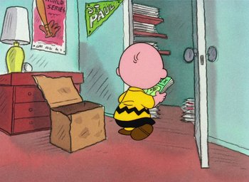 Movie still from “It's Christmastime Again, Charlie Brown” (1992), directed by Bill Melendez – A charlie brown character is standing in front of a cardboard box; Wide shot, High angle