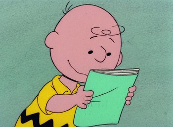 Movie still from “It's Christmastime Again, Charlie Brown” (1992), directed by Bill Melendez – A drawing of a bald man holding a green book; Close Up shot, High angle