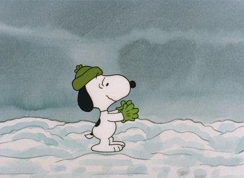 Movie still from “It's Christmastime Again, Charlie Brown” (1992), directed by Bill Melendez – A drawing of a dog wearing a green hat and gloves; Extreme Wide shot, High angle
