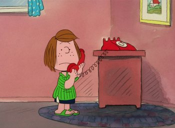 Movie still from “It's Christmastime Again, Charlie Brown” (1992), directed by Bill Melendez – A cartoon of a girl holding a phone up to her ear; Wide shot, High angle