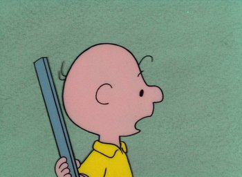 Movie still from “It's Christmastime Again, Charlie Brown” (1992), directed by Bill Melendez – A drawing of a bald man holding a book in his hand; Close Up shot, Low angle