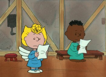 Movie still from “It's Christmastime Again, Charlie Brown” (1992), directed by Bill Melendez – A couple of people that are holding papers in their hands; Medium shot, High angle