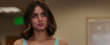 Movie still from “War Dogs” (2016), directed by Todd Phillips – A person wearing a blue shirt; Close Up shot, Over the shoulder angle