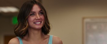 Movie still from “War Dogs” (2016), directed by Todd Phillips – A person smiling; Close Up shot, Over the shoulder angle