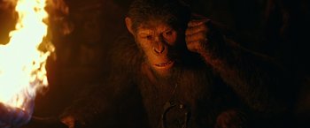 Movie still from “War for the Planet of the Apes” (2017), directed by Matt Reeves – A monkey with a chain around its neck; Close Up shot, Low angle