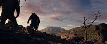 Movie still from “War for the Planet of the Apes” (2017), directed by Matt Reeves – An animal standing on top of a mountain; Extreme Wide shot, Low angle