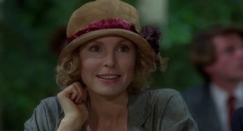 Movie still from “L.A. Story” (1991), directed by Mick Jackson – A person wearing a hat; Close Up shot, Over the shoulder angle