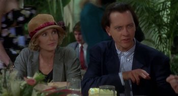 Movie still from “L.A. Story” (1991), directed by Mick Jackson – A man and a woman sitting at a dinner table; Close Up shot, Over the shoulder angle