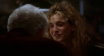 Movie still from “L.A. Story” (1991), directed by Mick Jackson – A person talking to another person; Close Up shot, Over the shoulder angle