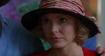 Movie still from “L.A. Story” (1991), directed by Mick Jackson – A person wearing a hat; Close Up shot, Over the shoulder angle