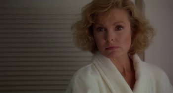 Movie still from “L.A. Story” (1991), directed by Mick Jackson – A person wearing a white robe; Close Up shot, Low angle