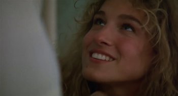 Movie still from “L.A. Story” (1991), directed by Mick Jackson – A woman's face with blue eyes; Close Up shot, Low angle