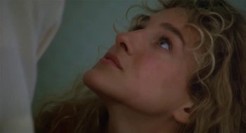 Movie still from “L.A. Story” (1991), directed by Mick Jackson – A person looking up at something; Close Up shot, Low angle