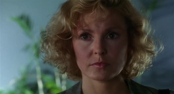 Movie still from “L.A. Story” (1991), directed by Mick Jackson – A person with curly blonde hair; Close Up shot, Low angle