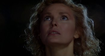 Movie still from “L.A. Story” (1991), directed by Mick Jackson – A person looking up at the sky; Close Up shot, Low angle