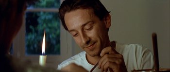 Movie still from “Nikita” (1990), directed by Luc Besson – A person brushing his teeth; Close Up shot, Low angle