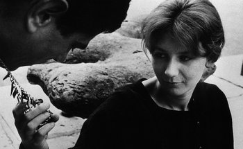 Movie still from “La Jetée” (1962), directed by Chris Marker – A man and a woman looking at one another; Close Up shot, Over the shoulder angle