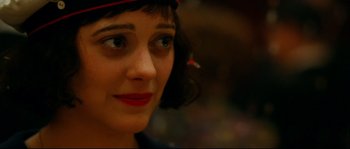 Movie still from “La Vie En Rose” (2007), directed by Olivier Dahan – A woman's face with a red hat on; Close Up shot, Low angle