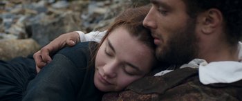 Movie still from “Lady Macbeth” (2016), directed by William Oldroyd – A man and a woman laying on top of each other; Close Up shot, High angle
