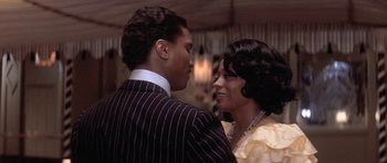 Movie still from “Lady Sings the Blues” (1972), directed by Sidney J. Furie – A man and a woman are dancing in a room; Close Up shot, Low angle