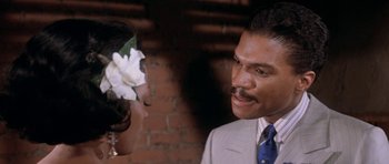 Movie still from “Lady Sings the Blues” (1972), directed by Sidney J. Furie – A man and a woman looking at one another; Close Up shot, Over the shoulder angle