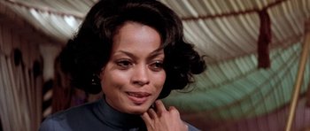 Movie still from “Lady Sings the Blues” (1972), directed by Sidney J. Furie – A woman that is looking at the camera; Close Up shot, Low angle