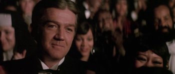 Movie still from “Lady Sings the Blues” (1972), directed by Sidney J. Furie – A person wearing a suit and tie; Close Up shot, Low angle