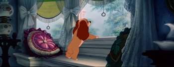 Movie still from “Lady and the Tramp” (1955), directed by Clyde Geronimi – A brown and white dog standing next to a window; Wide shot, Low angle