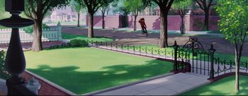 Movie still from “Lady and the Tramp” (1955), directed by Clyde Geronimi – A man riding a bike through a park with trees; Extreme Wide shot, Low angle