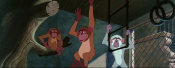 Movie still from “Lady and the Tramp” (1955), directed by Clyde Geronimi – A group of three monkeys hanging from a ceiling; Wide shot, Low angle