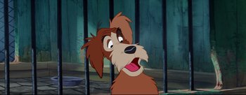 Movie still from “Lady and the Tramp” (1955), directed by Clyde Geronimi – A cartoon dog with his mouth wide open; Close Up shot, High angle