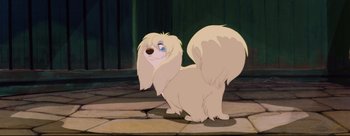 Movie still from “Lady and the Tramp” (1955), directed by Clyde Geronimi – A dog that is standing on the ground; Medium shot, Low angle