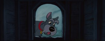 Movie still from “Lady and the Tramp” (1955), directed by Clyde Geronimi – A cartoon dog looking out of a window; Close Up shot, Low angle