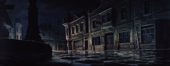Movie still from “Lady and the Tramp” (1955), directed by Clyde Geronimi – An oil painting of an empty street at night; Extreme Wide shot, High angle