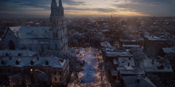 An aerial view of a city at night with lights