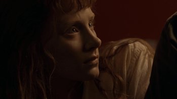 Movie still from “Lady in the Water” (2006), directed by M. Night Shyamalan – The face of a young woman; Close Up shot, Low angle