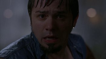 Movie still from “Lady in the Water” (2006), directed by M. Night Shyamalan – A person with wet hair; Close Up shot, Low angle