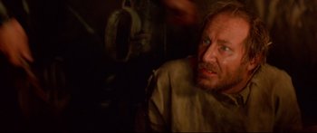 Movie still from “Ladyhawke” (1985), directed by Richard Donner – A person with a beard; Close Up shot, High angle