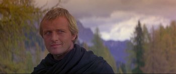 Movie still from “Ladyhawke” (1985), directed by Richard Donner – A person wearing a scarf; Close Up shot, Low angle