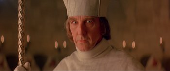 Movie still from “Ladyhawke” (1985), directed by Richard Donner – A person wearing a hat; Close Up shot, Low angle