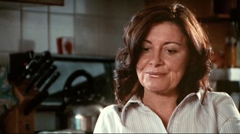 Movie still from “Lake Mungo” (2008), directed by Joel Anderson – A person wearing a white shirt; Close Up shot, Over the shoulder angle