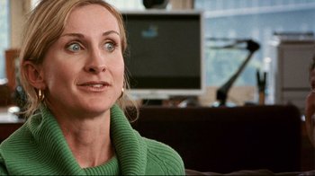 Movie still from “Lake Mungo” (2008), directed by Joel Anderson – A person sitting in front of a computer; Close Up shot, Over the shoulder angle