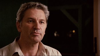 Movie still from “Lake Mungo” (2008), directed by Joel Anderson – A person wearing a white shirt; Close Up shot, Low angle