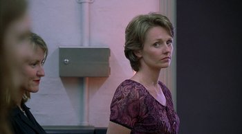 Movie still from “Lantana” (2001), directed by Ray Lawrence – A person wearing a purple shirt; Close Up shot, Over the shoulder angle
